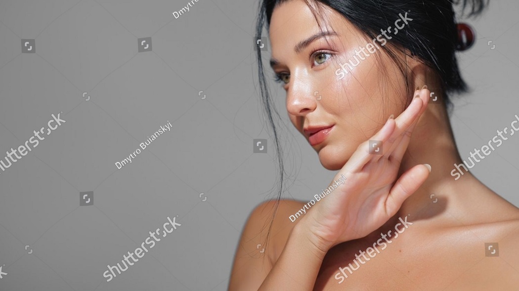 stock-photo-stunning-side-view-portrait-of-a-young-woman-with-radiant-healthy-skin-in-soft-natural-lighting-2525426203